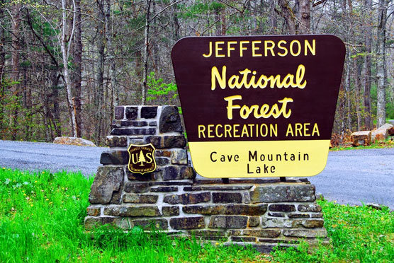 Cave-Mountain-Lake-Sign